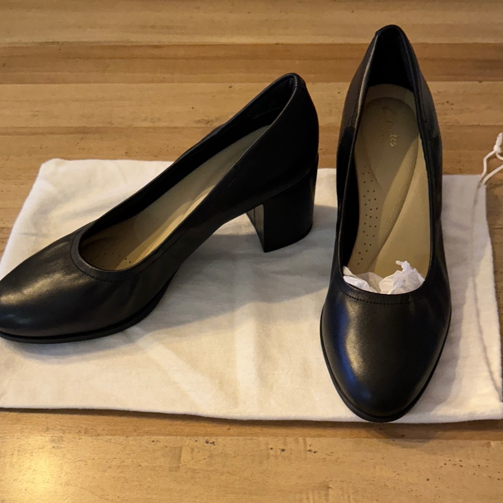 Brand new with labels, black leather Clarks heels